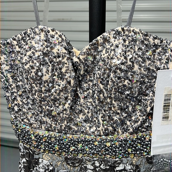 Elegant Jovani style 2184. Color is Dark Grey. Size 2. - Picture 8 of 8